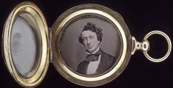 Daguerreotype of John A. MacDonald contained in a gold locket.