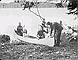 Grey Owl meets a party of tourists at Beaver Lodge, Ajawaan Lake, Prince Albert National Park, Saskatchewan, 1920s