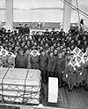 Photograph of nurses and officers on board the re-christened HMCS LETITIA, April 1945