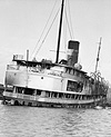 Photograph of the ruins of the S.S. NORONIC after the fire, September 19, 1949