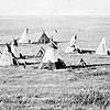 Photograph of a group of teepees at a Cree Camp, near Vermilion, Alberta, September 1871