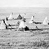 Photograph of a group of teepees at a Cree Camp, near Vermilion, Alberta, September 1871