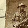 Photograph of sniper Michel Ackabee holding a gun, Fort William Band, Thunder Bay, Ontario, circa 1918-1919